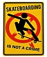 табличка skateboarding is not a crime