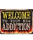 табличка welcome to your new addiction