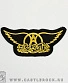 нашивка aerosmith (лого желтое, вышивка)