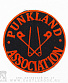 нашивка punkland association (надпись красная, булавки)